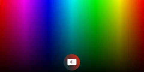 Un gradiente di colori vibranti, dal rosso al viola, blu, verde e giallo, con un'icona di riproduzione al centro. La profondità di colore è sorprendente.