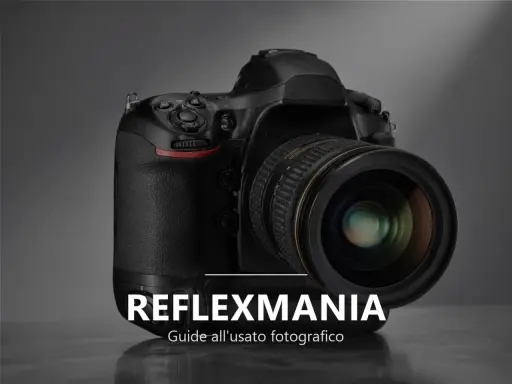 Una fotocamera reflex professionale con obiettivo, pronta per catturare momenti indimenticabili. Perfetta per ogni appassionato di fotografia.